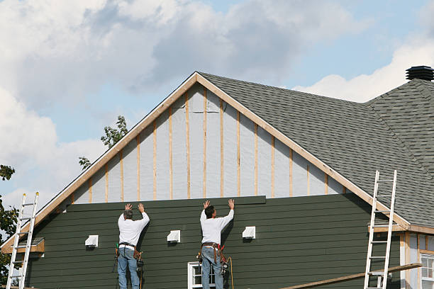 Professional Siding technician working in Mansfield, TX
